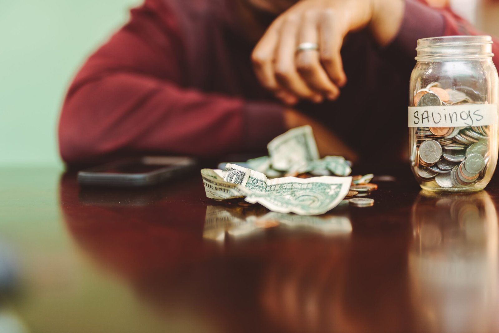 savings jar with money