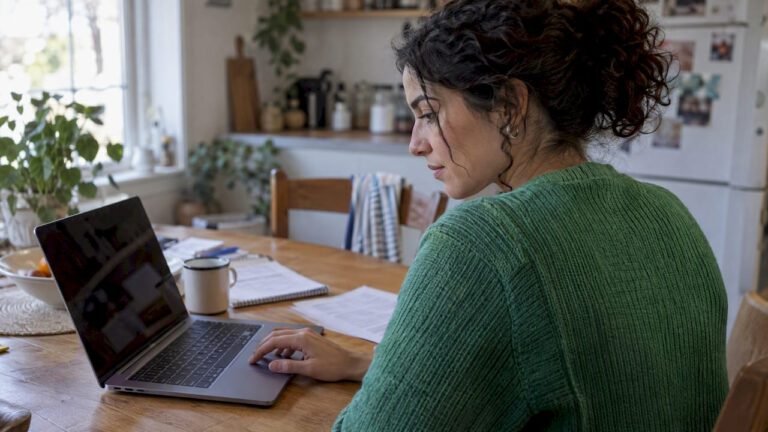 Woman comparing Roth IRA account fees