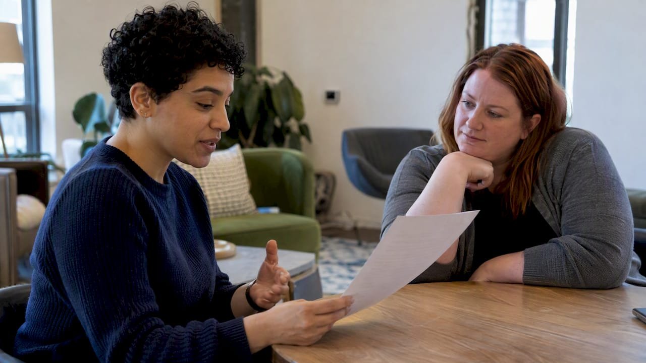 Professional rehearsing a brag sheet with a friend
